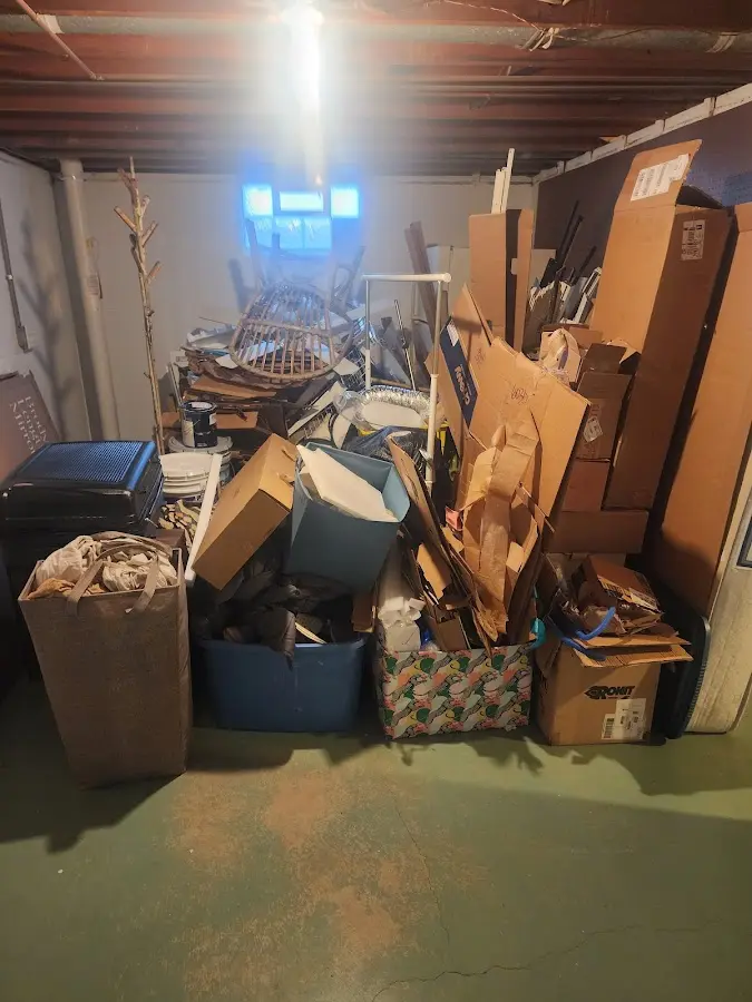 Roll-off dumpster container at job site for Yard Waste Dumpster Rental in Cheshire